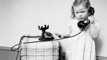 Child talking on the telephone